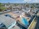 Aerial view of the property featuring a pool, covered patio, and neighborhood setting at 5407 W Cambridge Ave, Phoenix, AZ 85035