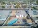 Aerial image showing a pool, patio, and fenced backyard in a residential area at 5407 W Cambridge Ave, Phoenix, AZ 85035