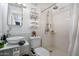 Modern bathroom with white tile, vessel sink, and walk-in shower at 5407 W Cambridge Ave, Phoenix, AZ 85035