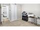 Neutral bedroom with closet and doorway to bathroom at 5407 W Cambridge Ave, Phoenix, AZ 85035