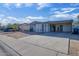 Charming single-story home with a covered parking and a well-maintained front yard at 5407 W Cambridge Ave, Phoenix, AZ 85035