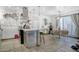 Open kitchen and dining area with modern island at 5407 W Cambridge Ave, Phoenix, AZ 85035