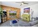 Stylish living room featuring a modern fireplace, accent wall, and comfortable seating at 5407 W Cambridge Ave, Phoenix, AZ 85035