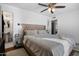 Serene main bedroom featuring neutral walls and bathroom access at 5407 W Cambridge Ave, Phoenix, AZ 85035