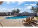 Relaxing backyard oasis with sparkling pool, comfortable seating, and inviting atmosphere at 5407 W Cambridge Ave, Phoenix, AZ 85035