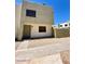 Charming townhome with a stucco exterior, sidewalk, and well maintained gravel yard at 5929 N 48Th Ave, Glendale, AZ 85301