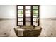 Spa-like bathroom with a unique soaking tub and large windows overlooking nature at 6019 N 62Nd Pl, Paradise Valley, AZ 85253