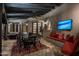 This expansive patio features comfortable seating, a large table, and outdoor ceiling fans at 6019 N 62Nd Pl, Paradise Valley, AZ 85253