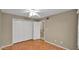 This is a bedroom that includes a ceiling fan and a closet with multiple doors at 6448 E Paso Nuevo Dr # 101, Cave Creek, AZ 85331