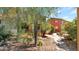 Property view showcasing two building exteriors with desert landscaping at 6448 E Paso Nuevo Dr # 101, Cave Creek, AZ 85331