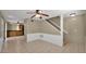 Open living room space adjacent to the kitchen area and staircase at 6448 E Paso Nuevo Dr # 101, Cave Creek, AZ 85331
