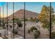 Relaxing balcony view featuring a lush golf course and mountain scenery creating a tranquil outdoor retreat at 6500 E Camelback Rd # 1010, Scottsdale, AZ 85251