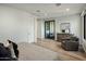 Bright bedroom with natural light, complemented by stylish furnishings and access to a private balcony at 6500 E Camelback Rd # 1010, Scottsdale, AZ 85251