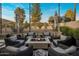 Outdoor patio featuring a cozy fire pit, comfortable seating, and stunning mountain views creating an inviting retreat at 6500 E Camelback Rd # 1010, Scottsdale, AZ 85251
