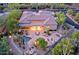 Beautiful aerial view of home with pool, outdoor seating area, and desert landscaping at 6591 E Amber Sun Dr, Scottsdale, AZ 85266