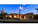 Charming single-story home with manicured landscaping and a three-car garage at 6591 E Amber Sun Dr, Scottsdale, AZ 85266