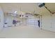 Spacious three car garage with ample storage and organization at 6591 E Amber Sun Dr, Scottsdale, AZ 85266