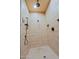 Modern shower with dual shower heads, custom tile design, and a convenient built-in niche at 6591 E Amber Sun Dr, Scottsdale, AZ 85266