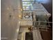 Spacious kitchen island with bar seating and stylish pendant lighting at 7222 E Gainey Ranch Rd # 106, Scottsdale, AZ 85258