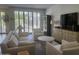Inviting living room with ample seating and natural light, perfect for relaxation at 7222 E Gainey Ranch Rd # 106, Scottsdale, AZ 85258
