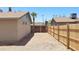 Fenced-in backyard with a privacy gate and plenty of space for customization at 7506 W Devonshire Ave, Phoenix, AZ 85033