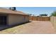 A fully fenced backyard provides privacy and security and opens to a patio space at 7506 W Devonshire Ave, Phoenix, AZ 85033