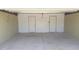 This is a clean, empty garage with two doors, ready for parking and storage at 7506 W Devonshire Ave, Phoenix, AZ 85033