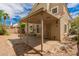 View of the covered patio in this backyard with block wall fencing for privacy at 826 W Devon Dr, Gilbert, AZ 85233