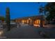 Back exterior showcasing a pool, desert landscaping, patio, and access to indoor and outdoor spaces at 8392 E Eagle Feather Rd, Scottsdale, AZ 85266