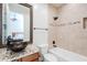 Bathroom features a modern vessel sink, granite countertop, and tiled shower and tub at 8392 E Eagle Feather Rd, Scottsdale, AZ 85266