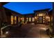 Charming courtyard with ample seating, manicured landscaping, and stone pathways at 8392 E Eagle Feather Rd, Scottsdale, AZ 85266