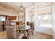 Open kitchen next to breakfast nook has stainless appliances and granite counters at 8392 E Eagle Feather Rd, Scottsdale, AZ 85266