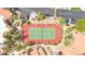Aerial view of tennis courts within the community, surrounded by mature landscaping, providing recreational opportunities for residents at 8787 E Mountain View Rd # 1087, Scottsdale, AZ 85258