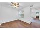 Bright bedroom with a ceiling fan, a window and laminate flooring at 8787 E Mountain View Rd # 1087, Scottsdale, AZ 85258