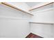This closet has wooden trim and shelves, and new hardwood flooring at 8787 E Mountain View Rd # 1087, Scottsdale, AZ 85258