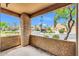 Relax on this covered patio with views of the landscaped community at 8787 E Mountain View Rd # 1087, Scottsdale, AZ 85258