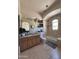 Elegant bathroom with tile floors, granite counters, and a soaking tub with natural lighting at 9267 E Rimrock Dr, Scottsdale, AZ 85255