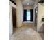 Luxurious bathroom featuring a large soaking tub, tile floors, and transom window at 9267 E Rimrock Dr, Scottsdale, AZ 85255