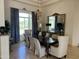 Formal dining room features a large mirror, chandelier, and seating for six at 9267 E Rimrock Dr, Scottsdale, AZ 85255