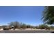 A sprawling single-story house with desert landscaping and a red tile roof at 9267 E Rimrock Dr, Scottsdale, AZ 85255