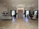 Expansive living room featuring tile flooring, neutral colors, and lots of space for entertaining at 9267 E Rimrock Dr, Scottsdale, AZ 85255