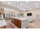 Spacious open concept kitchen and living room at 9369 W Via Montoya Dr, Peoria, AZ 85383