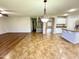 Spacious living room seamlessly connected to the kitchen at 10031 W Hess St, Tolleson, AZ 85353