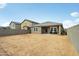 Expansive backyard with plenty of space for customization, surrounded by a sturdy block wall at 11008 N 165Th Ave, Surprise, AZ 85388