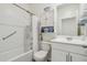 Clean bathroom design, with a shower-tub, toilet, and a storage cabinet for an organized space at 11008 N 165Th Ave, Surprise, AZ 85388