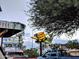 Exterior shot of the local Copper Star Coffee drive thru, with green foliage and bright signage at 1106 W Glenrosa Ave, Phoenix, AZ 85013