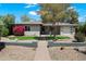Charming single-story home featuring desert landscaping, a tidy lawn, and a welcoming walkway at 1106 W Glenrosa Ave, Phoenix, AZ 85013