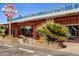 Exterior shot of Melrose Pharmacy, featuring the Wagon Wheel building and decorative greenery at 1106 W Glenrosa Ave, Phoenix, AZ 85013