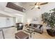 Bright living room featuring soaring ceilings and a cozy seating arrangement at 1114 W Windjammer Dr, Gilbert, AZ 85233