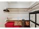 Functional walk-in closet equipped with rods, shelves, and storage, offering a practical and organized space at 1114 W Windjammer Dr, Gilbert, AZ 85233